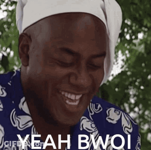 Man In Suit Smiling At Fish Tank GIF