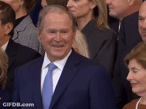 Man In Suit Smiling GIF