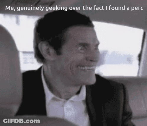 Man In Suit Smiling In Car GIF