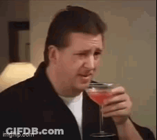 Man In Suit Smiling Making Face GIF