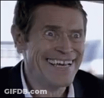 Man In Suit Smiling Making Funny Face GIF