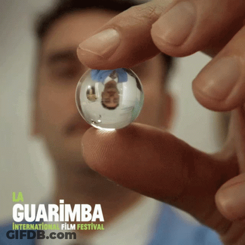 Man In Suit Smiling Next To Young Boy GIF