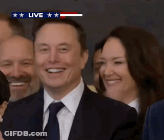 Man In Suit Smiling On Live Broadcast GIF