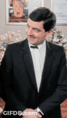 Man In Suit Smiling GIF