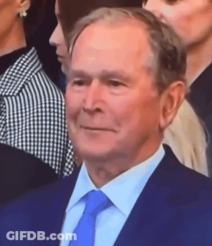 Man In Suit Smiling GIF