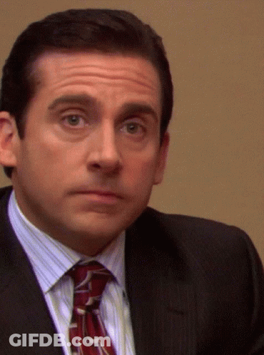 Man In Suit Smiling Saying HR Violation GIF