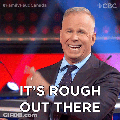 Man In Suit Smiling Saying It's Rough Out There GIF