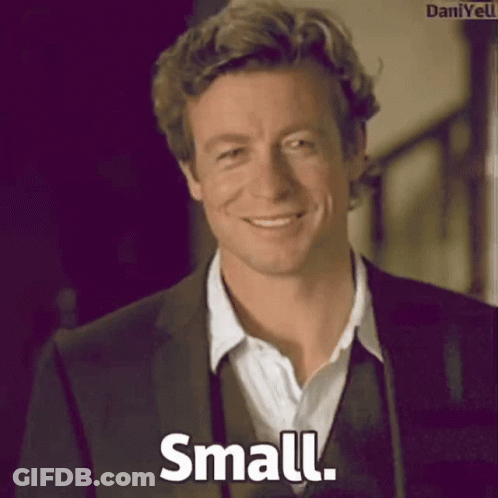 Man In Suit Smiling Saying Small GIF