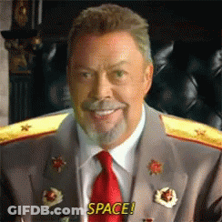 Man In Suit Smiling Says Space GIF