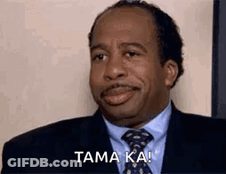 Man In Suit Smiling Says Tama Ka GIF