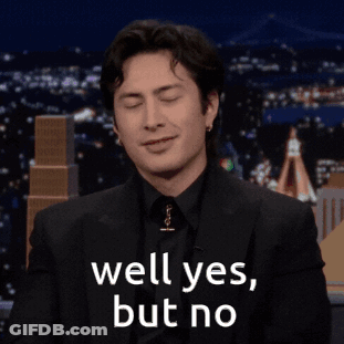 Man In Suit Smiling Says Well Yes But No GIF