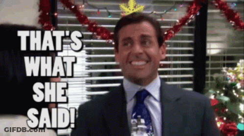 Man In Suit Smiling Says What She Said GIF