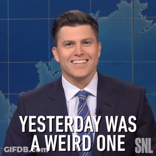 Man In Suit Smiling Says Yesterday Was A Weird One GIF