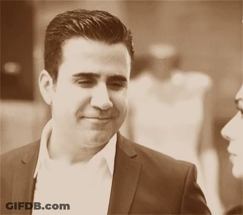 Man In Suit Smiling Sepia Photo GIF