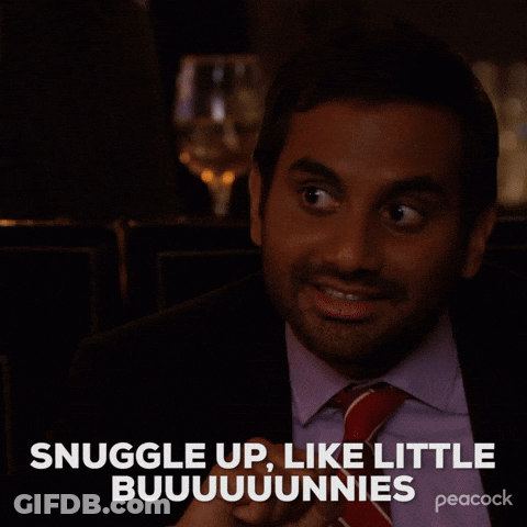 Man In Suit Smiling Snuggle Like Bunnies GIF