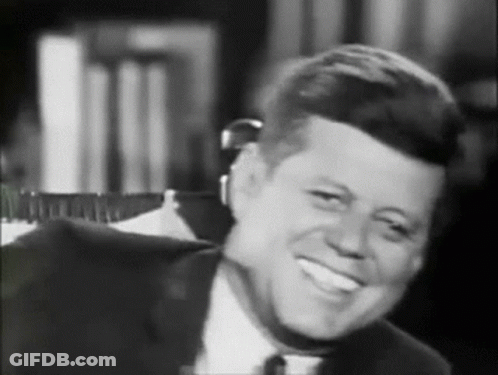 Man In Suit Smiling GIF