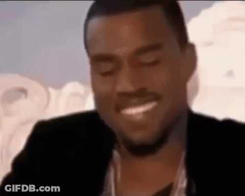 Man In Suit Smiling With Eyes Closed GIF