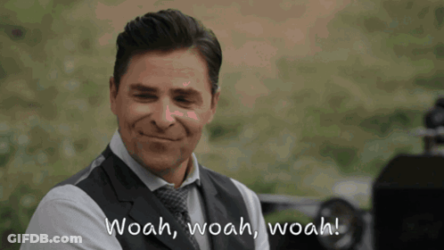 Man In Suit Smiling With Woah Woah Woah GIF