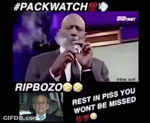Man In Suit Smoking At Microphone In Car GIF