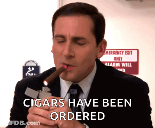 Man In Suit Smoking Cigar GIF