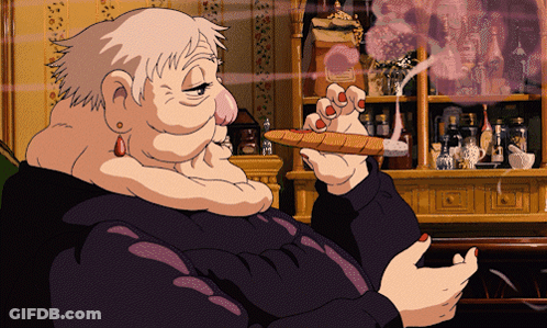 Man In Suit Smoking Cigar On TV Saying Yesilkom GIF
