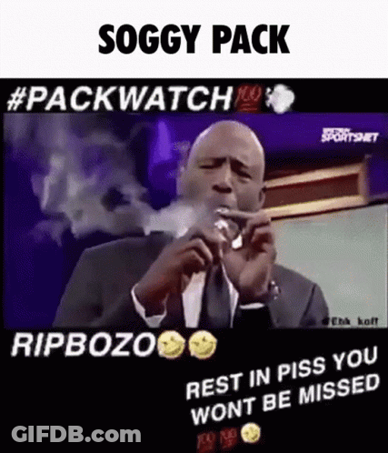 Man In Suit Smoking Cigarette GIF