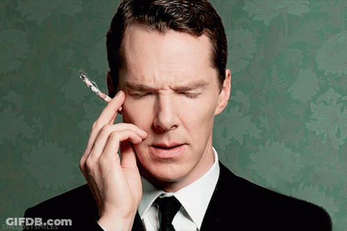 Man In Suit Smoking Cigarette Lost Smiles GIF