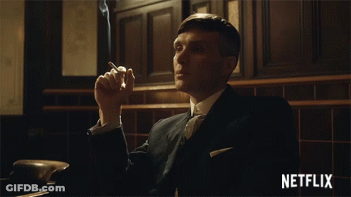 Man In Suit Smoking Cigarette Netflix GIF