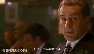 Man In Suit Smoking Cigarette Says Fuckin Wack Em GIF