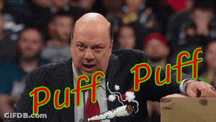 Man In Suit Smoking Saying Puff Puff GIF