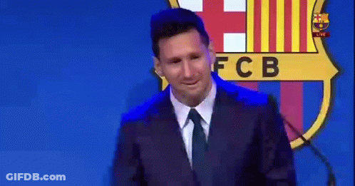 Man In Suit Speaking At Microphone With FCB Logo GIF