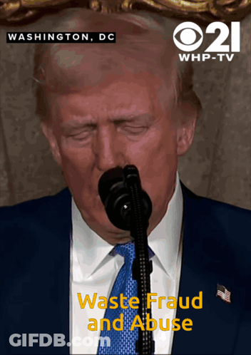 Man In Suit Speaking Into Mic Waste Fraud Abuse GIF