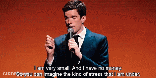 Man In Suit Speaking Into Microphone GIF