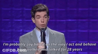 Man In Suit Speaking Into Microphone GIF