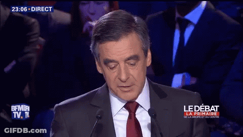 Man In Suit Speaking Into Microphone Alors Dis-Moi GIF
