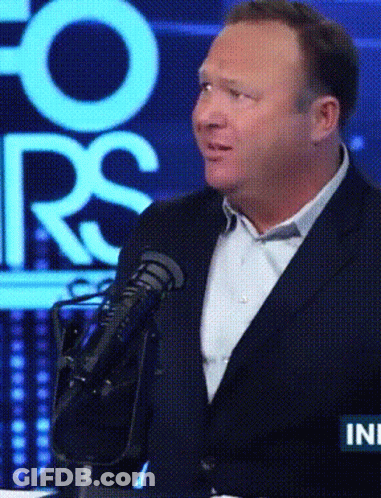 Man In Suit Speaking Into Microphone At Fox News GIF