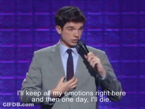Man In Suit Speaking Into Microphone Saying I'll Keep All My Emotions GIF