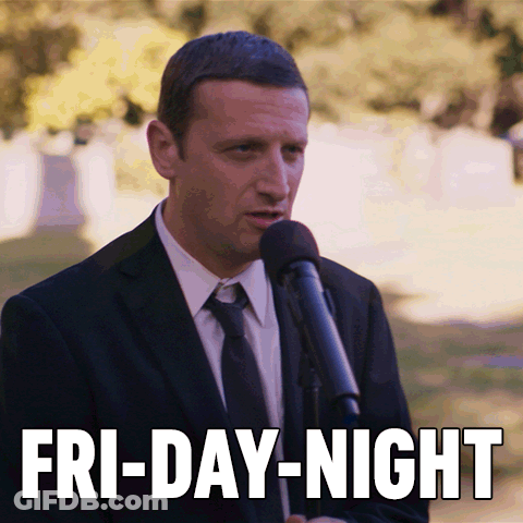 Man In Suit Speaking Into Microphone With Fri-Day-Night GIF