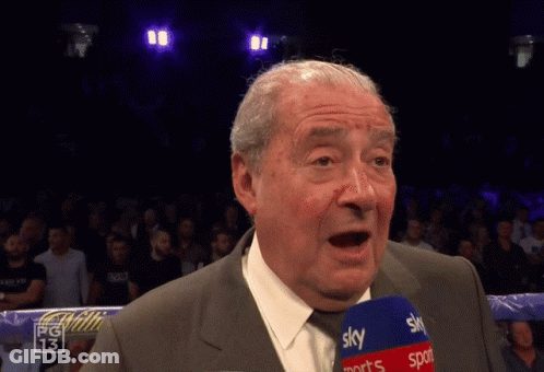 Man In Suit Speaking Into Sky Sports Microphone GIF