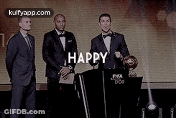 Man In Suit Speaking Podium Two Men Behind GIF
