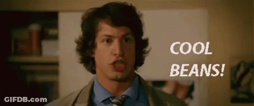 Man In Suit Standing Before Cool Beans Poster GIF