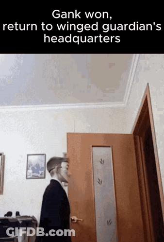 Man In Suit Standing Before Door Caption Gank Won Return To Winged Guardian's Headquarter GIF