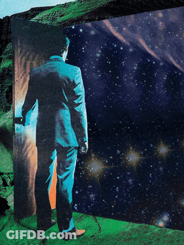 Man In Suit Standing Before Open Galaxy Door GIF