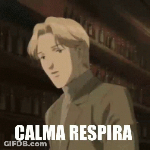 Man In Suit Standing Before Shelf Saying Calma Respira GIF