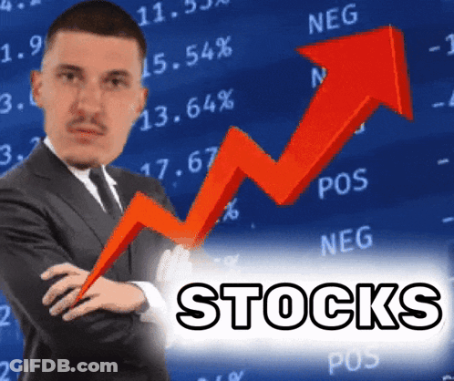 Man In Suit Standing Before Stocks Graph GIF