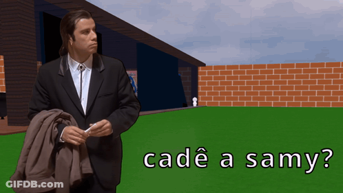 Man In Suit Standing In Front Of Brick Wall GIF