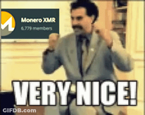 Man In Suit Standing In Front Of Monero XMR Sign GIF