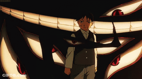 Man In Suit Standing In Front Of Monster Mouth GIF