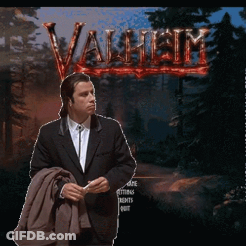 Man In Suit Standing In Front Of Video Game GIF