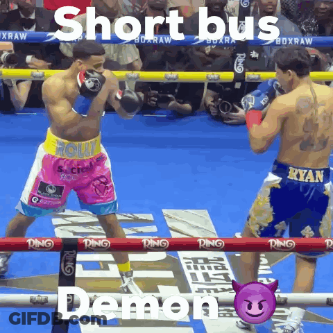 Man In Suit Standing Next To Man In Wheelchair In Front Of Ambulance Van GIF
